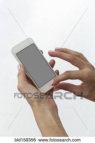 Close up of Caucasian woman using cell phone View Large Photo Image Stock Photograph - Close up of Caucasian woman using cell phone. Fotosearch