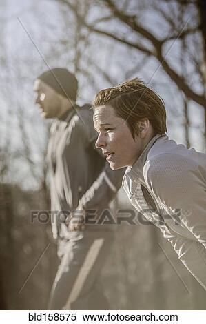 Close up of runner resting outdoors View Large Photo Image Stock Photography - Close up of runner resting outdoors. Fotosearch