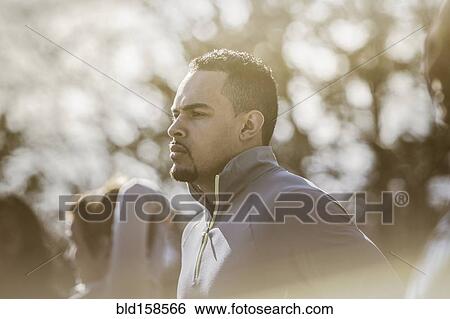 Close up of serious athlete outdoors View Large Photo Image Stock Photograph - Close up of serious athlete outdoors. Fotosearch