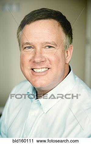 Close up of smiling Caucasian businessman View Large Photo Image Stock Image - Close up of smiling Caucasian businessman. Fotosearch
