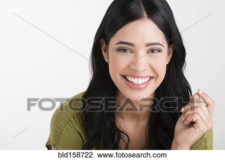 Close up of smiling Hispanic woman View Large Photo Image Stock Image - Close up of smiling Hispanic woman. Fotosearch