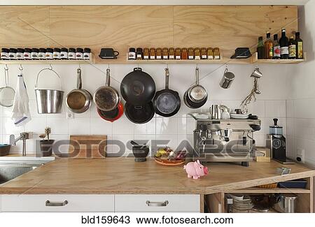 Stock Image - Counter space and cooking utensils in modern kitchen. Fotosearch