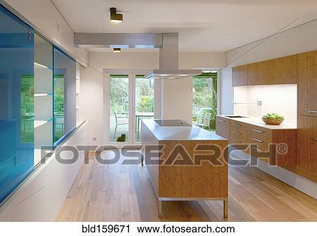 Stock Image - Counters and cabinets in modern kitchen. Fotosearch