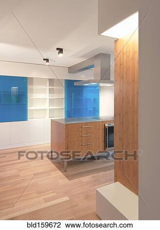 Stock Image - Counters, cabinets and shelves in modern kitchen. Fotosearch