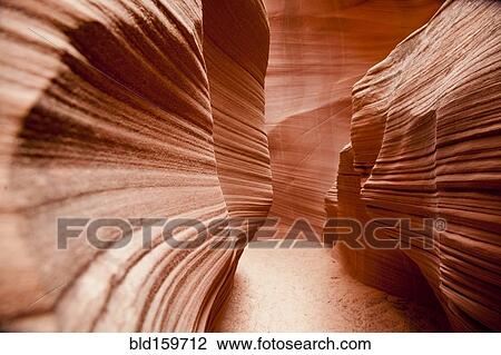 Curving rock walls in Antelope Canyon, Page, Arizona, United States View Large Photo Image Stock Image - Curving rock walls in Antelope Canyon, Page, Arizona, United States. Fotosearch