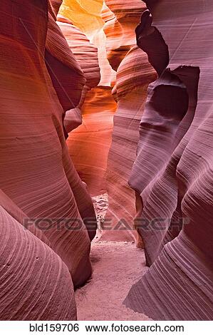 Stock Photograph - Curving rock walls in Antelope Canyon, Page, Arizona, United States. Fotosearch