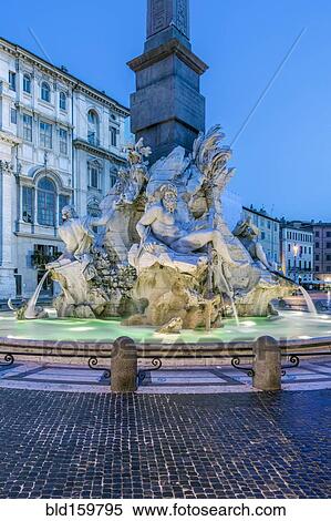 Stock Photography - Four Rivers Fountain illuminated at night, Rome, Italy. Fotosearch