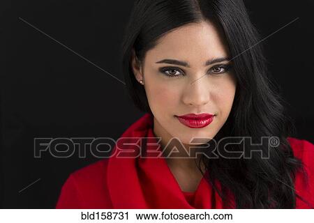 Stock Image - Glamorous Hispanic woman smiling. Fotosearch