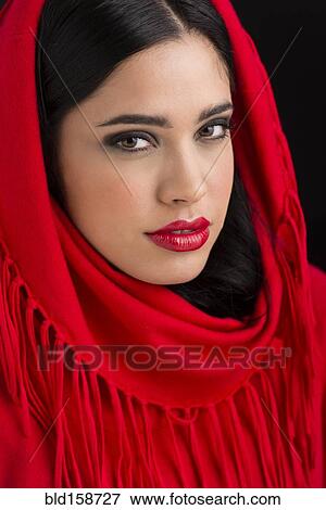 Stock Photo - Glamorous Hispanic woman wearing headscarf. Fotosearch
