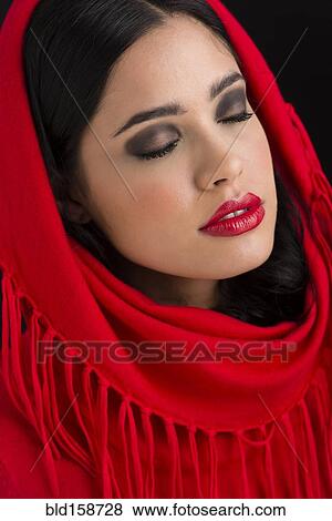 Stock Photo - Glamorous Hispanic woman wearing headscarf. Fotosearch