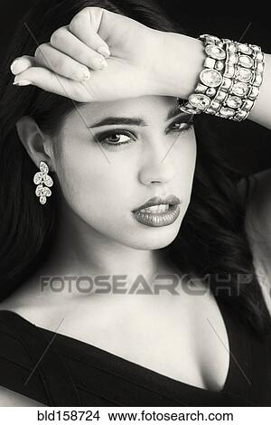 Glamorous serious Hispanic woman View Large Photo Image Picture - Glamorous serious Hispanic woman. Fotosearch