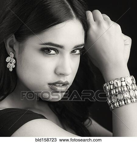 Stock Image - Glamorous serious Hispanic woman. Fotosearch
