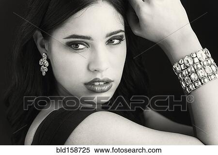 Glamorous serious Hispanic woman View Large Photo Image Stock Photography - Glamorous serious Hispanic woman. Fotosearch