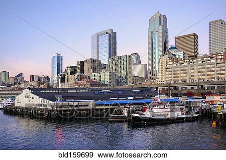 Highrise buildings in Seattle cityscape on waterfront, Washington, United States View Large Photo Image Stock Photo - Highrise buildings in Seattle cityscape on waterfront, Washington, United States. Fotosearch