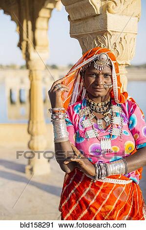 Indian woman wearing traditional jewelry View Large Photo Image Stock Image - Indian woman wearing traditional jewelry. Fotosearch