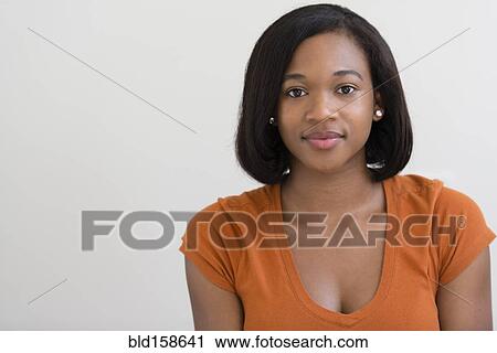 Stock Image - Mixed race woman smiling. Fotosearch