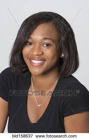 Mixed race woman smiling View Large Photo Image Stock Photo - Mixed race woman smiling. Fotosearch