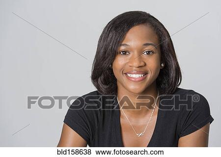 Mixed race woman smiling View Large Photo Image Stock Photo - Mixed race woman smiling. Fotosearch