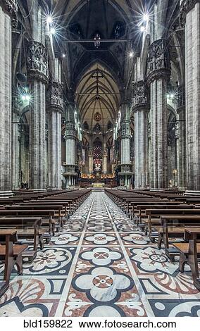 Stock Image - Ornate architecture and tile mosaics in Duomo di Milano, Milan, Italy. Fotosearch