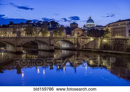 Ornate buildings and bridge illuminated at night, Rome, Italy View Large Photo Image Stock Photograph - Ornate buildings and bridge illuminated at night, Rome, Italy. Fotosearch