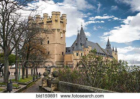 Ornate castle tower and spires with courtyard, Segovia, Spain View Large Photo Image Stock Image - Ornate castle tower and spires with courtyard, Segovia, Spain. Fotosearch