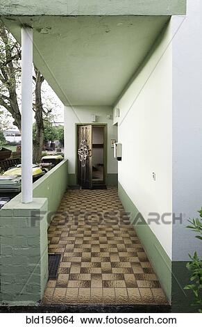 Picture - Patio walkway and doorway of retro home. Fotosearch