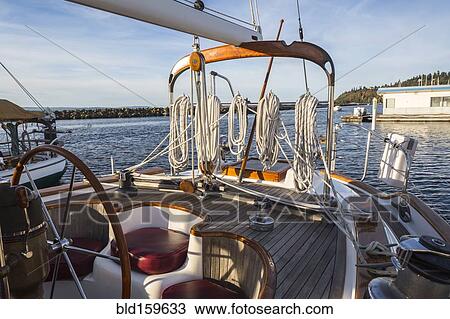 Ropes and rigging on sailboat deck View Large Photo Image Stock Image - Ropes and rigging on sailboat deck. Fotosearch