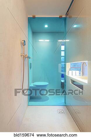 Shower with glass wall in modern bathroom View Large Photo Image Picture - Shower with glass wall in modern bathroom. Fotosearch
