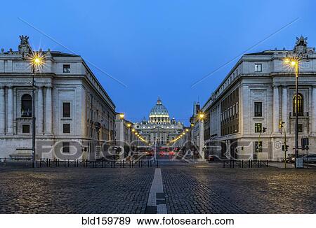 Stock Photo - St Peter's Basilica and buildings illuminated at night, Rome, Italy. Fotosearch