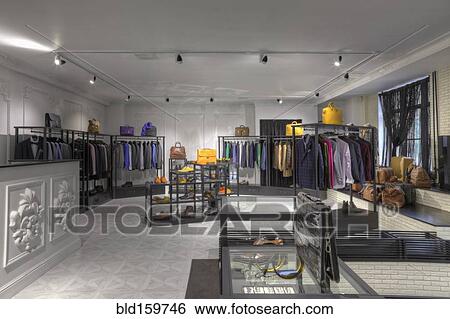 Suits and shoes in clothing store for men View Large Photo Image Stock Photograph - Suits and shoes in clothing store for men. Fotosearch