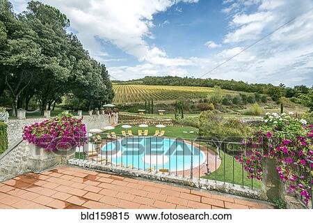 Swimming pool on hotel grounds, Radda in Chianti, Siena, Italy View Large Photo Image Stock Photography - Swimming pool on hotel grounds, Radda in Chianti, Siena, Italy. Fotosearch