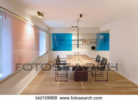 Table and chairs in modern dining room View Large Photo Image Stock Photo - Table and chairs in modern dining room. Fotosearch