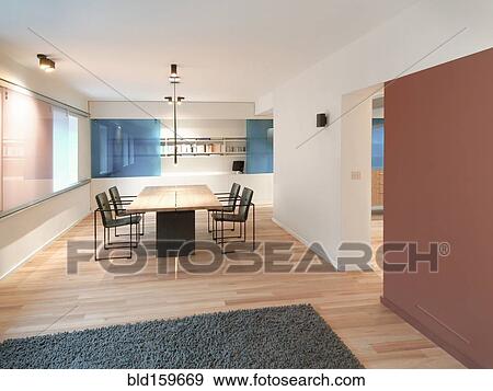 Table and chairs in modern dining room View Large Photo Image Stock Photo - Table and chairs in modern dining room. Fotosearch