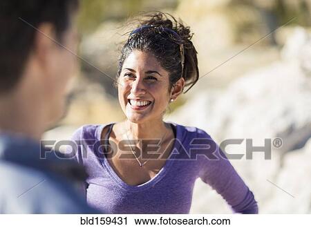 Woman smiling outdoors View Large Photo Image Stock Image - Woman smiling outdoors. Fotosearch