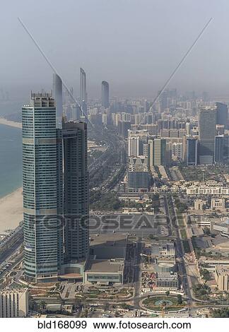 Stock Photo - Aerial view of high rise buildings in Abu Dhabi cityscape, Abu Dhabi Emirate, United Arab Emirates. Fotosearch