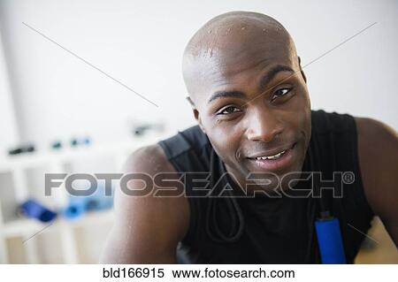 Black man resting in gym View Large Photo Image Stock Photography - Black man resting in gym. Fotosearch