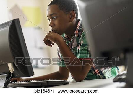 Black students using computers in classroom View Large Photo Image Stock Image - Black students using computers in classroom. Fotosearch