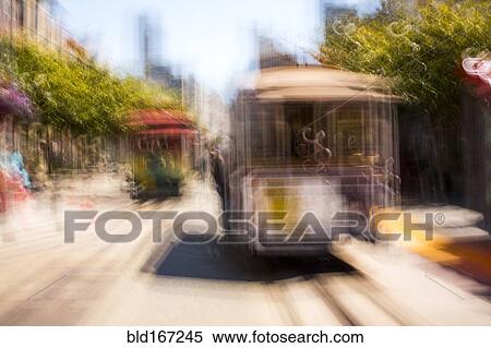 Stock Photography - Blurred view of cable cars on tracks, San Francisco, California, United States. Fotosearch