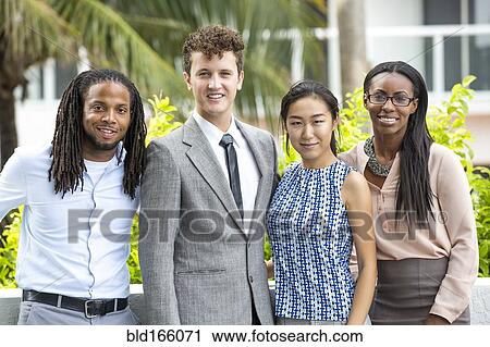 Business people smiling outdoors View Large Photo Image Stock Image - Business people smiling outdoors. Fotosearch