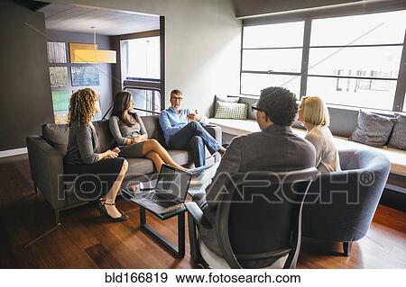 Business people talking in office meeting View Large Photo Image Stock Photo - Business people talking in office meeting. Fotosearch