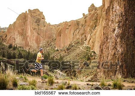 Caucasian man running near desert hills, Smith Rock State Park, Oregon, United States View Large Photo Image Stock Photo - Caucasian man running near desert hills, Smith Rock State Park, Oregon, United States. Fotosearch