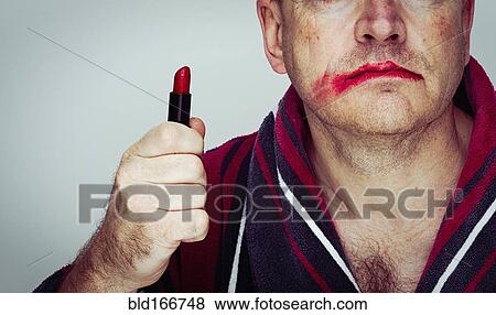 Caucasian man wearing smeared lipstick View Large Photo Image Stock Photo - Caucasian man wearing smeared lipstick. Fotosearch