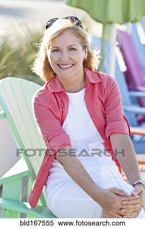 Stock Photography - Caucasian woman smiling outdoors. Fotosearch