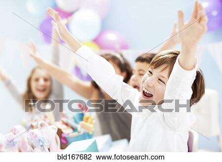 Children cheering at birthday party View Large Photo Image Stock Image - Children cheering at birthday party. Fotosearch