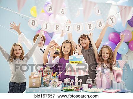 Children cheering at birthday party View Large Photo Image Stock Photo - Children cheering at birthday party. Fotosearch