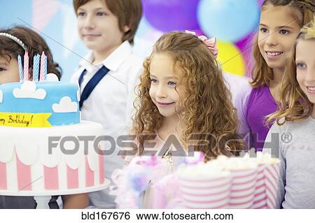Children smiling at birthday party View Large Photo Image Stock Photograph - Children smiling at birthday party. Fotosearch