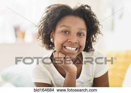 Close up of Black girl smiling View Large Photo Image Picture - Close up of Black girl smiling. Fotosearch