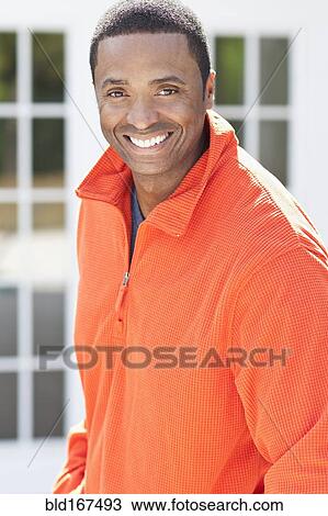 Close up of Black man smiling outdoors View Large Photo Image Stock Image - Close up of Black man smiling outdoors. Fotosearch
