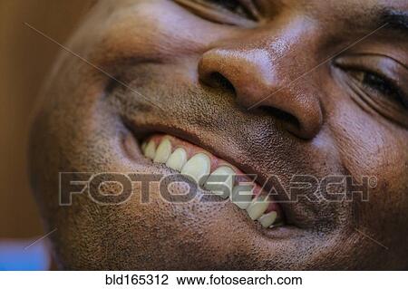 Close up of Black man smiling View Large Photo Image Stock Image - Close up of Black man smiling. Fotosearch