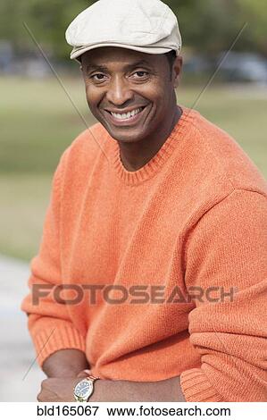 Close up of Black man smiling View Large Photo Image Stock Photo - Close up of Black man smiling. Fotosearch